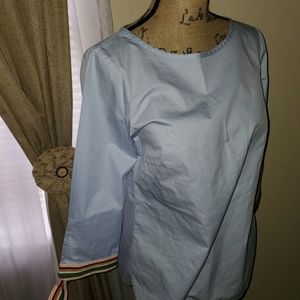 Baby blue, ribbon sleeve shirt.